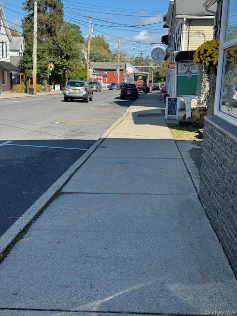 282 Main Street, Unit 1 Cornwall, NY 12518 - Photo 2 of 22 a view of street with cars