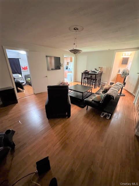 282 Main Street, Unit 1 Cornwall, NY 12518 - Photo 4 of 22 a living room with furniture and a flat screen tv
