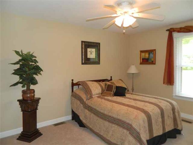 4517 Chandler Road Hermitage, TN 37076 - Photo 14 of 20 Second Bedroom: 15 x 11 Located on the main level, a full private bath, a large closet, offers a gorgeous view of the backyard. Along with new carpet, new fixtures and freshly painted