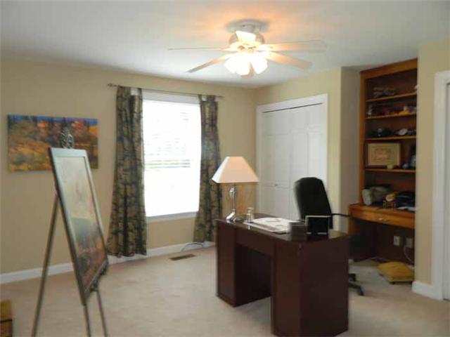 4517 Chandler Road Hermitage, TN 37076 - Photo 15 of 20 Third Bedroom: 14 x 12 Located on the main level, this room is located on the front side of the house, offers 2 large closets, custom built-in desk/shelving unit, new carpet, new fixtures and freshly painted