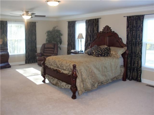 4517 Chandler Road Hermitage, TN 37076 - Photo 5 of 20 Master Suite: 27 x 15 spacious & luxurious is the only way to describe this room. Offering new carpet, crown molding, freshly painted, chair-rail, 2 ceiling fans, 3 oversized windows with wood blinds, amazing 24 x 13 walk-in closet