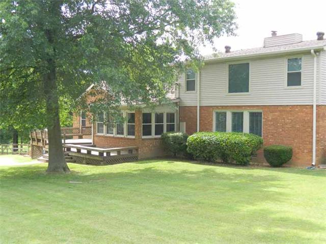 4517 Chandler Road Hermitage, TN 37076 - Photo 6 of 20 Extensive Landscaping, Up-lighting across the front, accent lighting and Surrounded by Mature Trees, multi-level Deck, gorgeous views from deck & Florida Rm