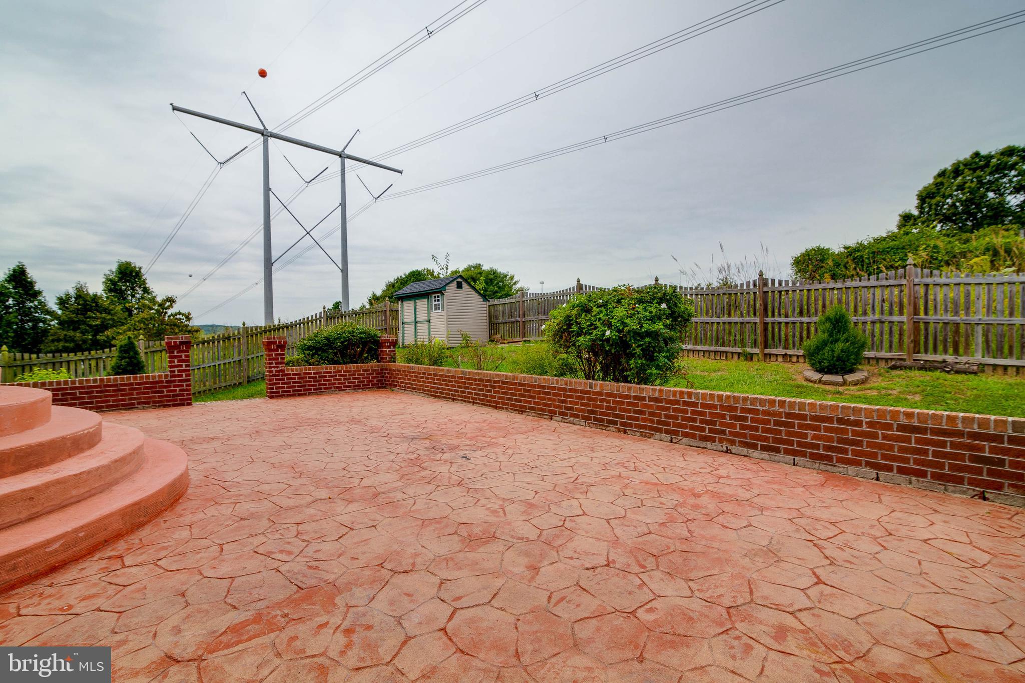 17608 Overlook Road Dumfries, VA 22026 - Photo 42 of 52 Stamped patio and knee wall!