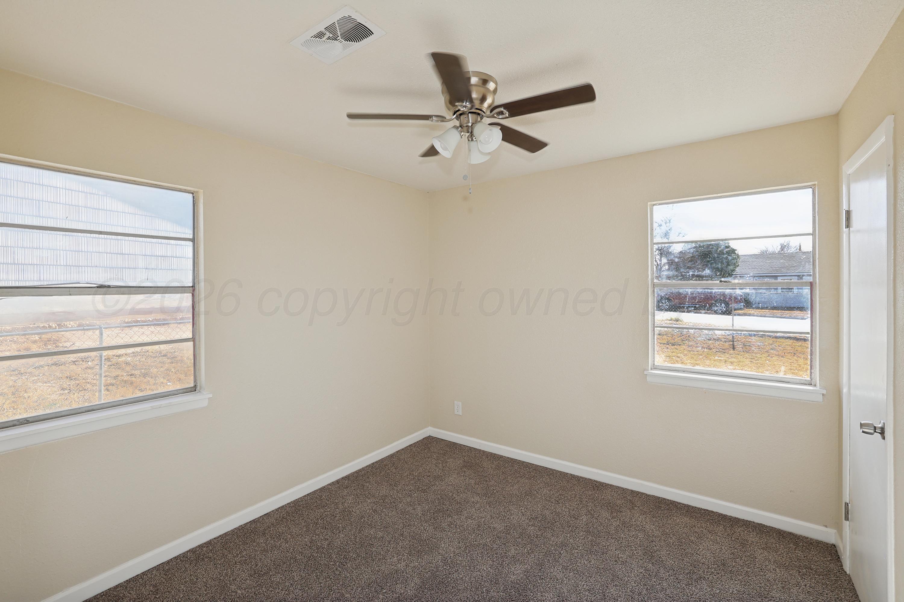1203 Sycamore Avenue Amarillo, TX 79107 - Photo 12 of 21 17-2nd Bedroom
