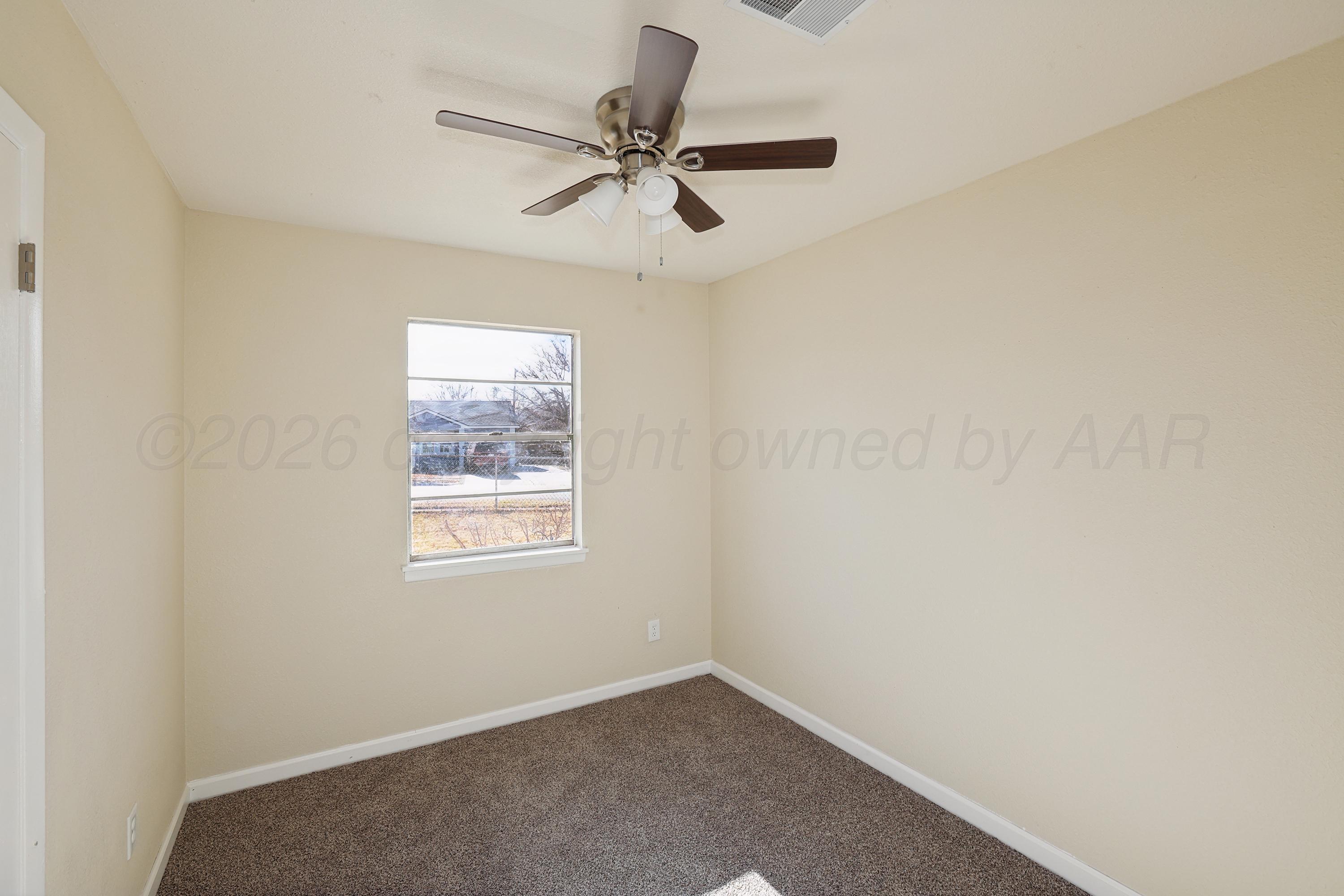 1203 Sycamore Avenue Amarillo, TX 79107 - Photo 14 of 21 19-3rd Bedroom