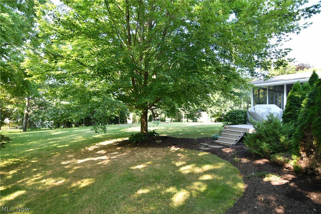 1356 Walnut Ridge Drive Uniontown, OH 44685 - Photo 5 of 35 Private treed backyard!