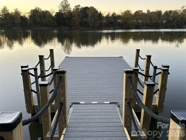 a view of a lake with deck