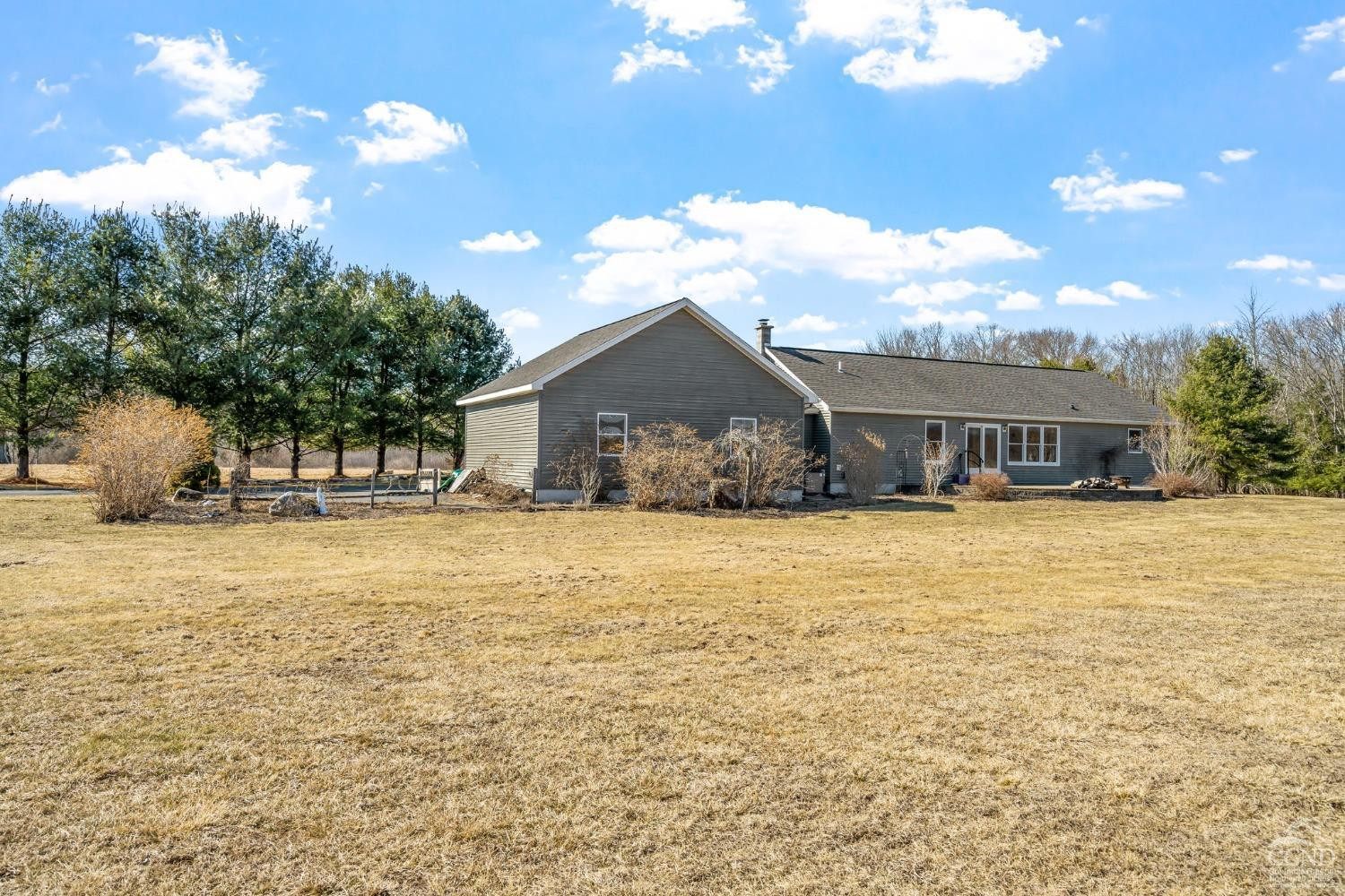 16 Deerfield Circle Copake, NY 12516 - Photo 29 of 40 a front view of a house with a garden