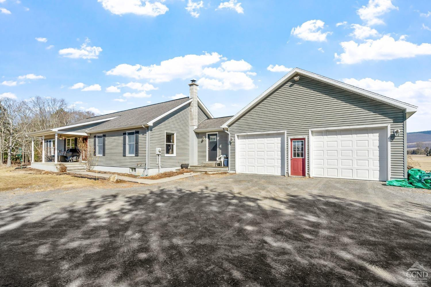 16 Deerfield Circle Copake, NY 12516 - Photo 34 of 40 a front view of a house with a garden and yard