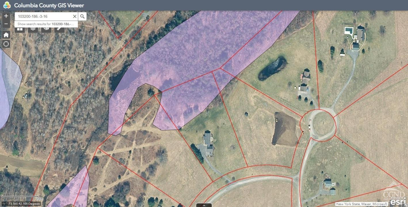 16 Deerfield Circle Copake, NY 12516 - Photo 40 of 40 a bathroom with a sink and mirror with bathtub