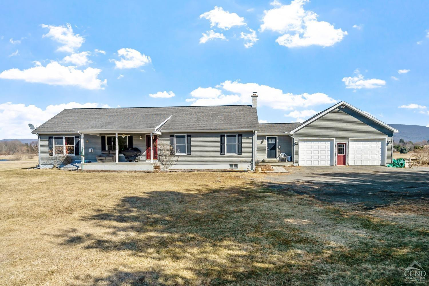 16 Deerfield Circle Copake, NY 12516 - Photo 4 of 40 a front view of a house with a garden