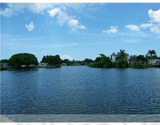 5303 Riddle Road Holiday, FL 34690 - Photo 1 of 1 Exterior Front - Beautiful Lake Diane!