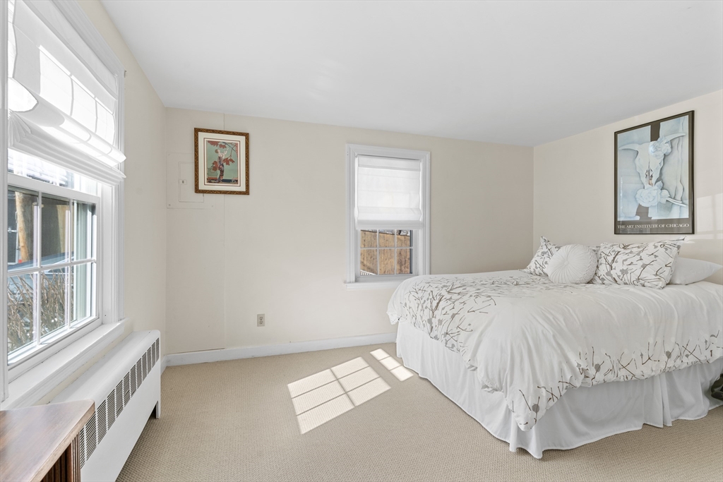 327 Bridle Path Worcester, MA 01604 - Photo 14 of 40 a bedroom with a bed and a window
