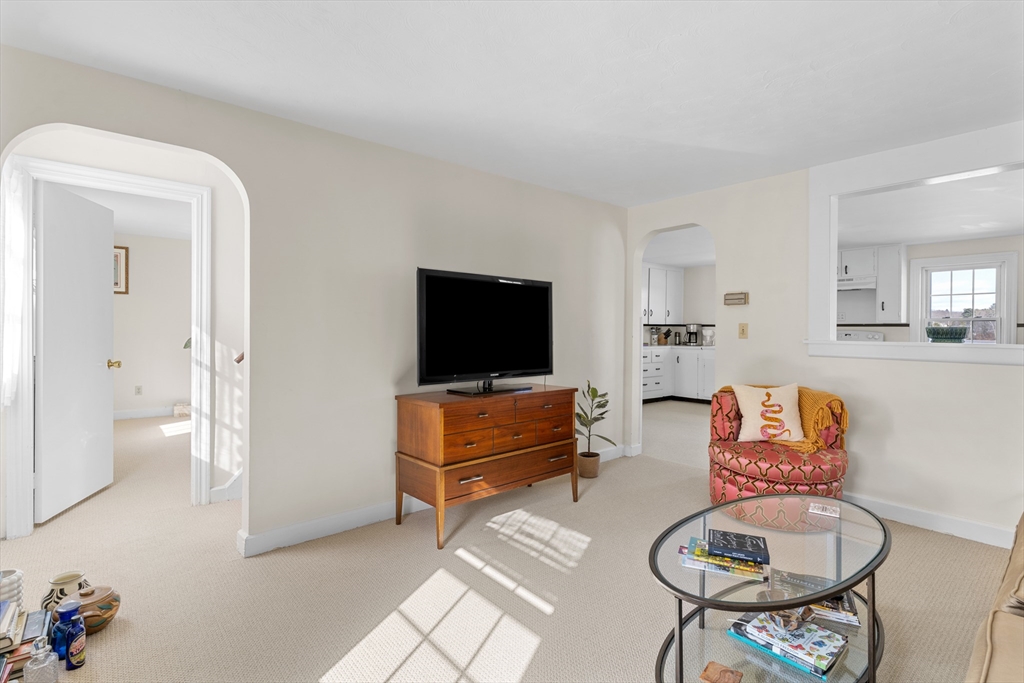 327 Bridle Path Worcester, MA 01604 - Photo 6 of 40 a living room with furniture and a flat screen tv