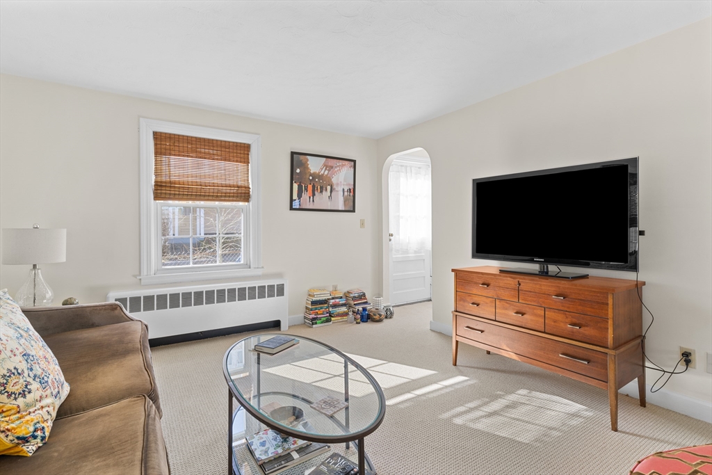 327 Bridle Path Worcester, MA 01604 - Photo 7 of 40 a living room with furniture and a flat screen tv