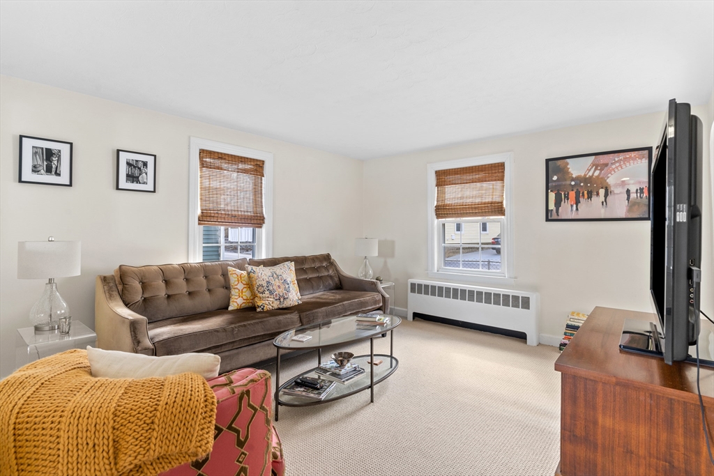 327 Bridle Path Worcester, MA 01604 - Photo 8 of 40 a living room with furniture and a flat screen tv
