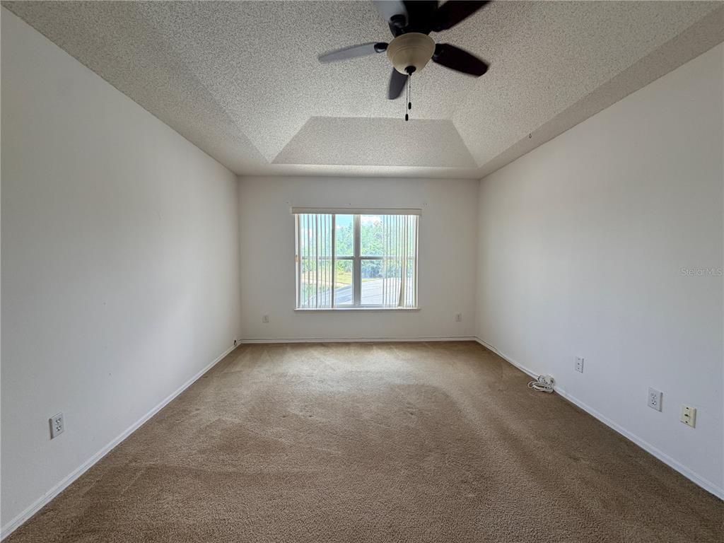 1214 Timberbend Circle Orlando, FL 32824 - Photo 16 of 31 an empty room with a window