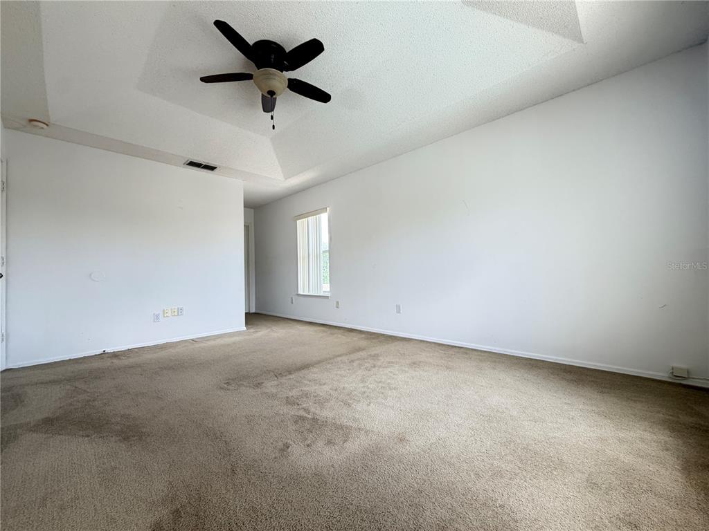 1214 Timberbend Circle Orlando, FL 32824 - Photo 17 of 31 a view of an empty room with a window