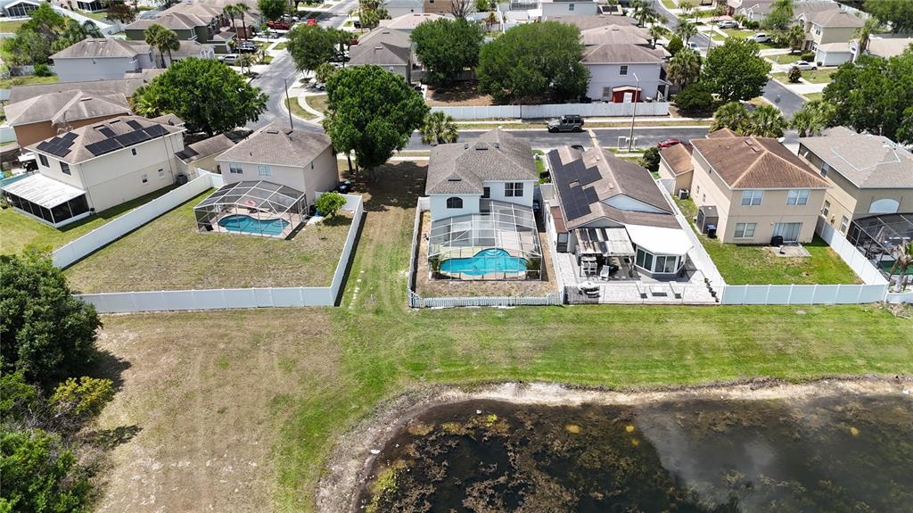 1214 Timberbend Circle Orlando, FL 32824 - Photo 31 of 31 an aerial view of residential houses with outdoor space and swimming pool