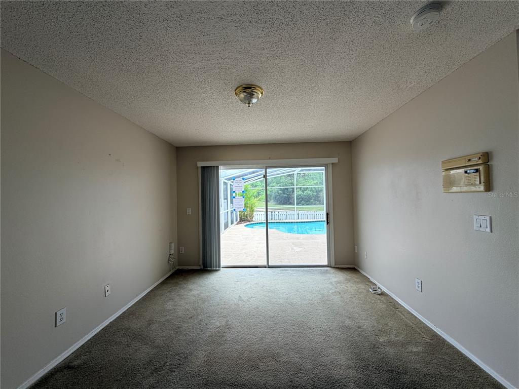1214 Timberbend Circle Orlando, FL 32824 - Photo 6 of 31 a view of an empty room with a window