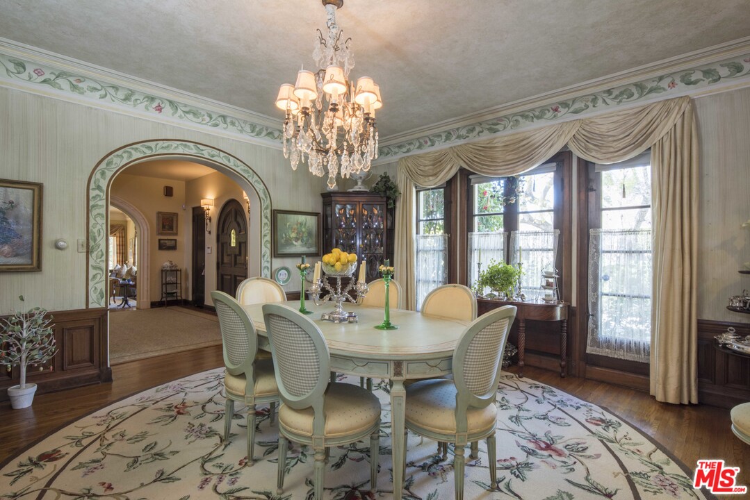 508 South Rimpau Boulevard Los Angeles, CA 90020 - Photo 21 of 48 a view of a dining room with furniture window and wooden floor