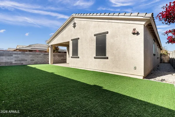 a view of a back yard of the house