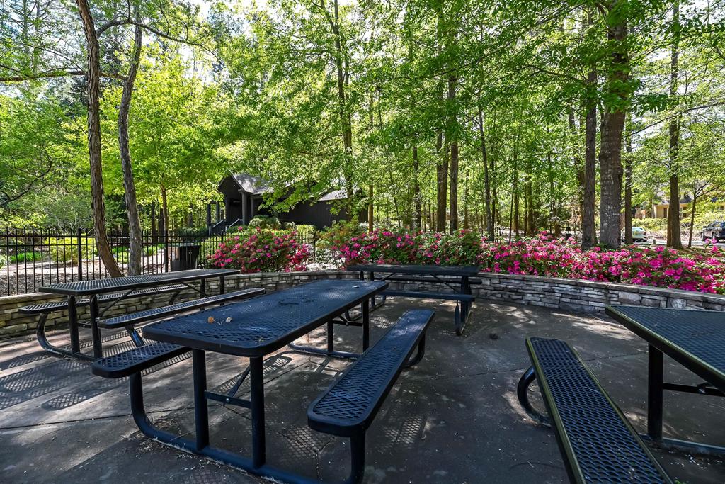 279 White Oak Road Pine Mountain, GA 31822 - Photo 11 of 25 a view of a chairs and table in a backyard