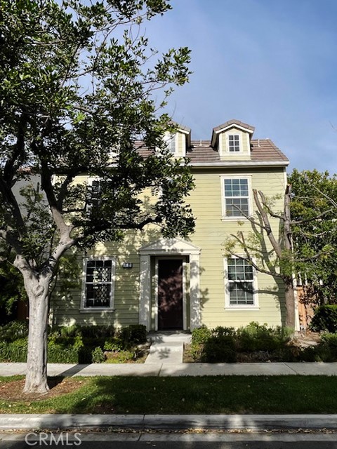 a front view of a house with yard