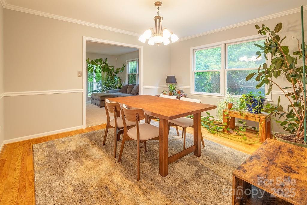 908 Newfound Road Leicester, NC 28748 - Photo 13 of 46 a dining room with furniture and window