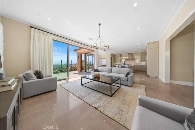 a bedroom with a bed and a view of kitchen