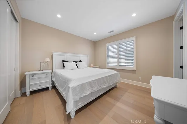 a view of a garden with an outdoor seating