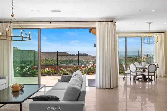 front view of a brick house with a yard