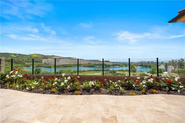 an aerial view of residential building with outdoor space lake and lake view
