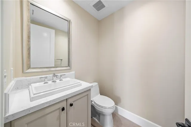a white bath tub sitting next to a window