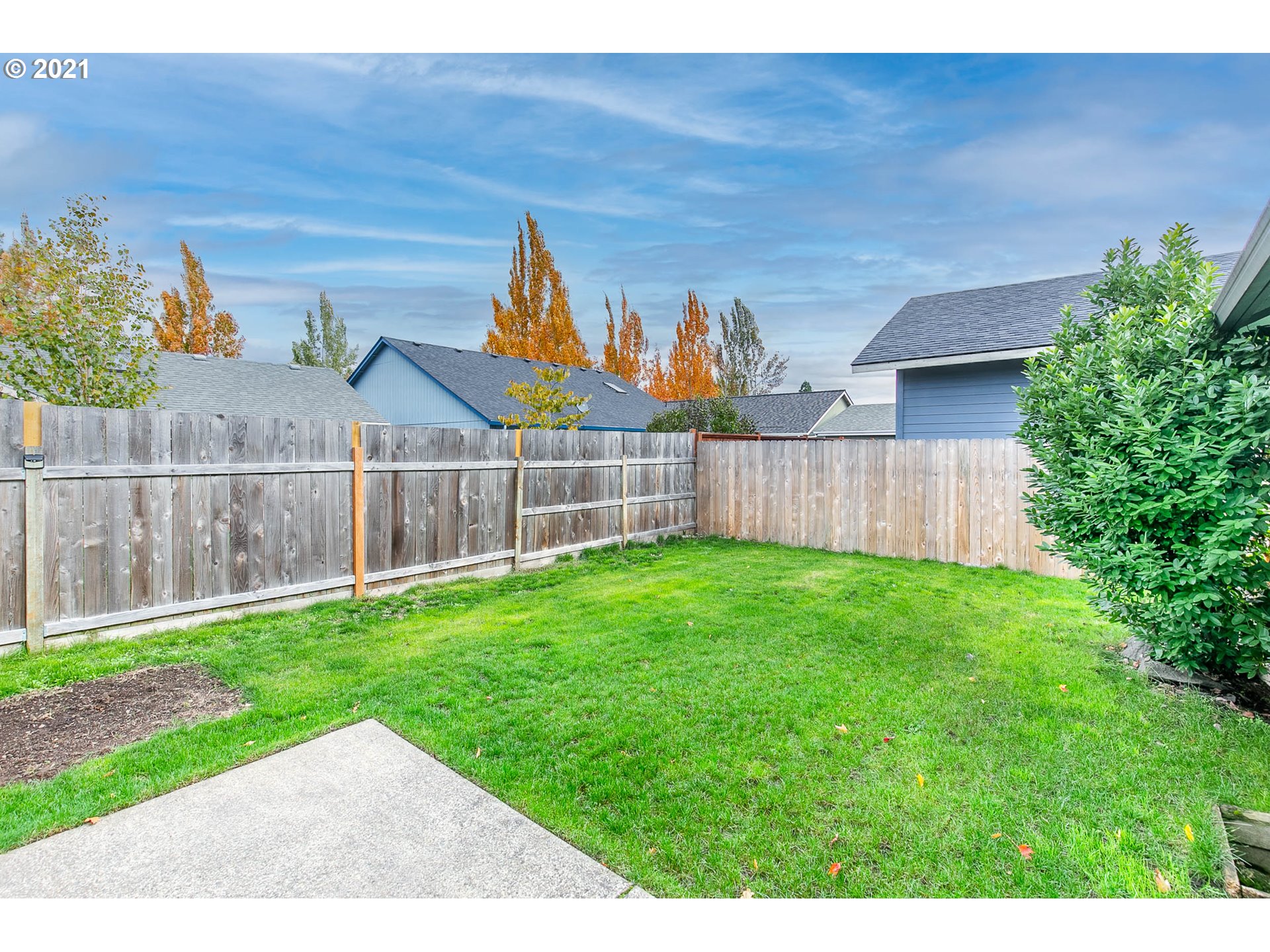 4049 Virginia Avenue Springfield, OR 97478 - Photo 30 of 32 a view of a backyard with a garden