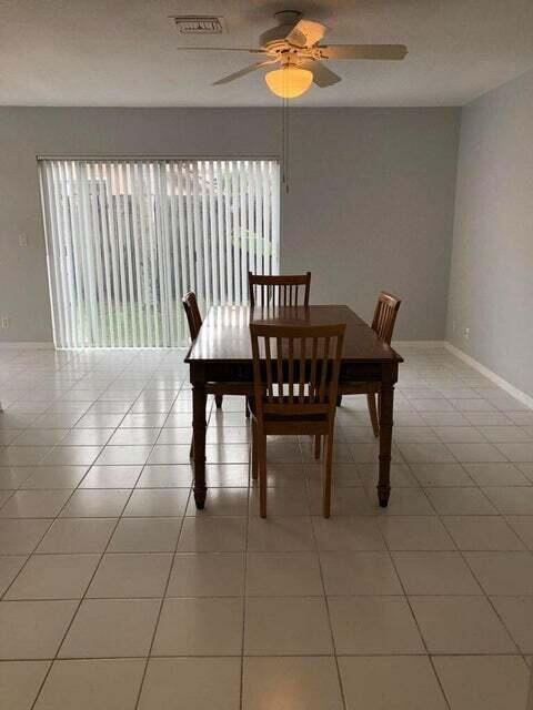 23344 Sunview Way Boca Raton, FL 33428 - Photo 13 of 23 a view of a dining room with furniture