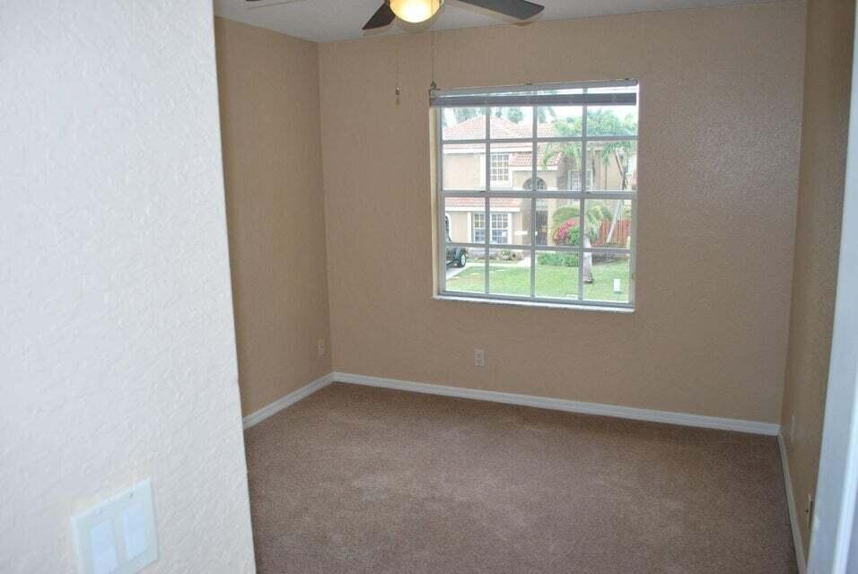 23344 Sunview Way Boca Raton, FL 33428 - Photo 14 of 23 an empty room with a window