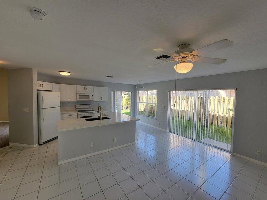 23344 Sunview Way Boca Raton, FL 33428 - Photo 19 of 23 a view of a electric appliances and windows in a room