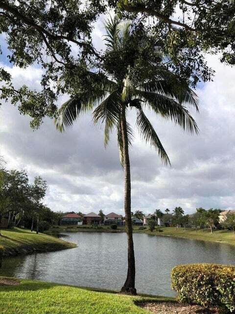 23344 Sunview Way Boca Raton, FL 33428 - Photo 3 of 23 a view of a lake with boats and trees