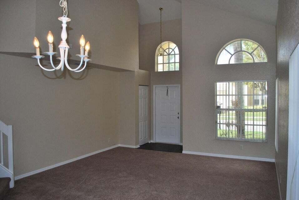 23344 Sunview Way Boca Raton, FL 33428 - Photo 7 of 23 an empty room with a window