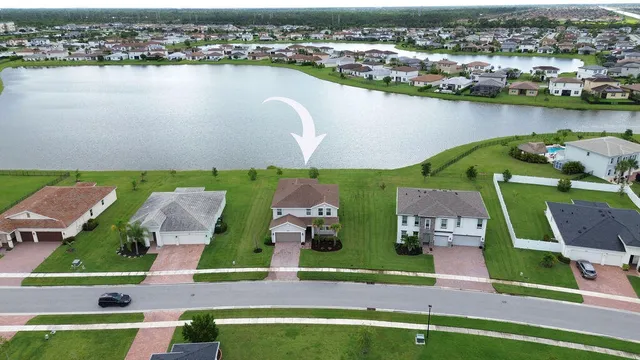 a view of a swimming pool with an outdoor seating