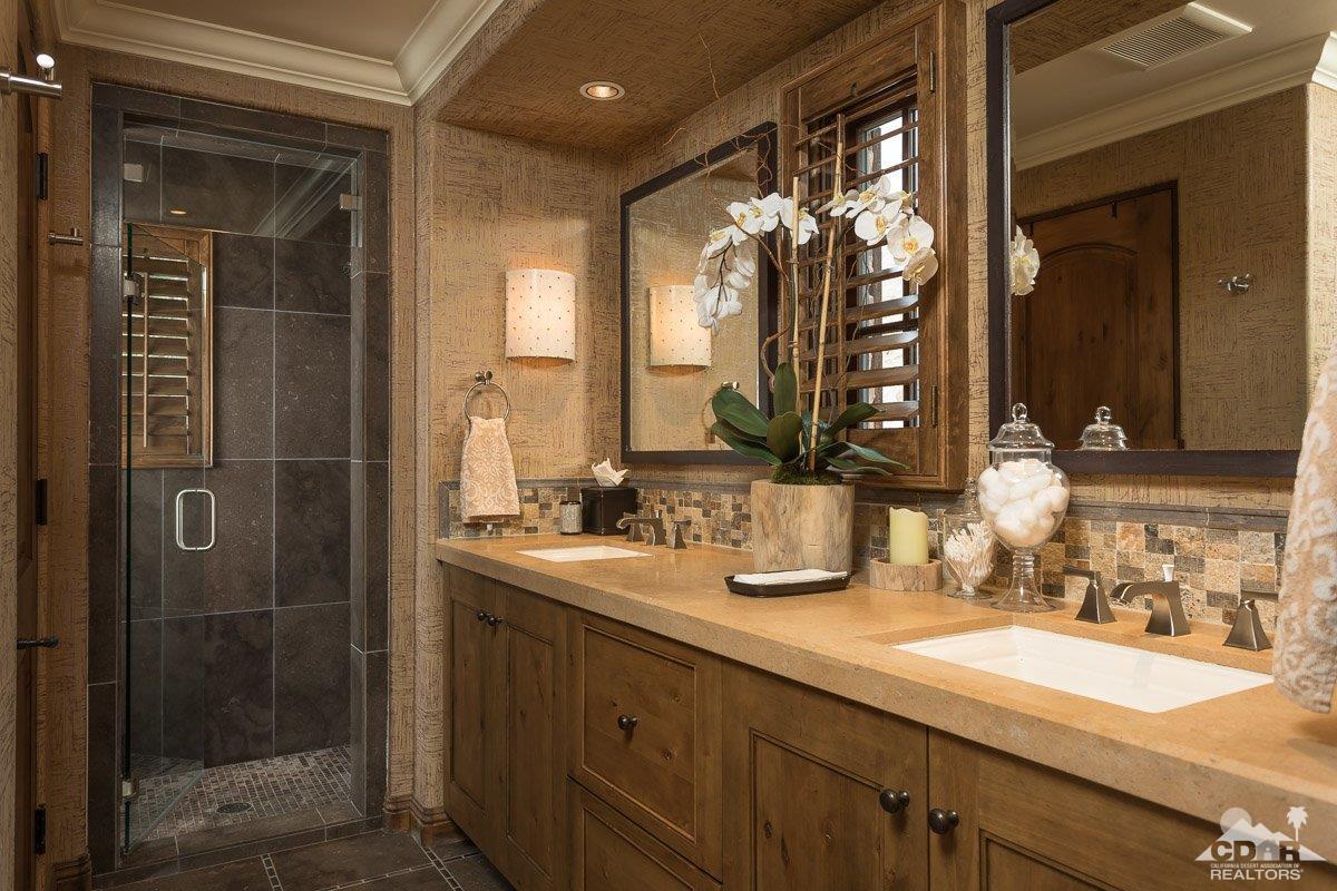 1 Santa Rosa Mountain Lane Rancho Mirage, CA 92270 - Photo 16 of 23 a bathroom with a double vanity sink mirror and shower
