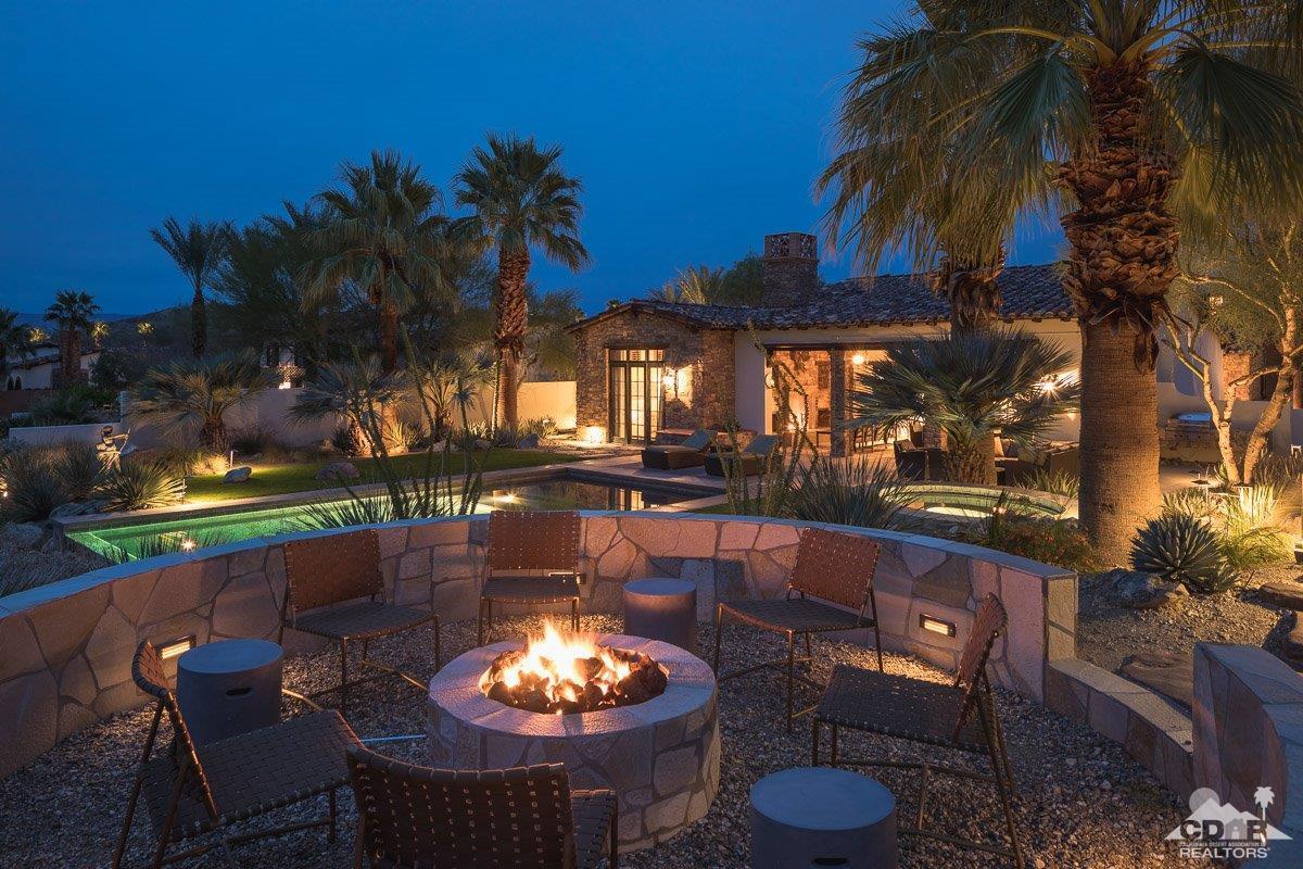 1 Santa Rosa Mountain Lane Rancho Mirage, CA 92270 - Photo 21 of 23 a view of a patio with swimming pool table and chairs