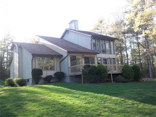 18 Dunham Road Freetown, MA 02702 - Photo 1 of 28 a front view of a house with a garden