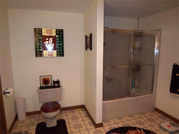 18 Dunham Road Freetown, MA 02702 - Photo 20 of 28 a bathroom with a toilet and a shower