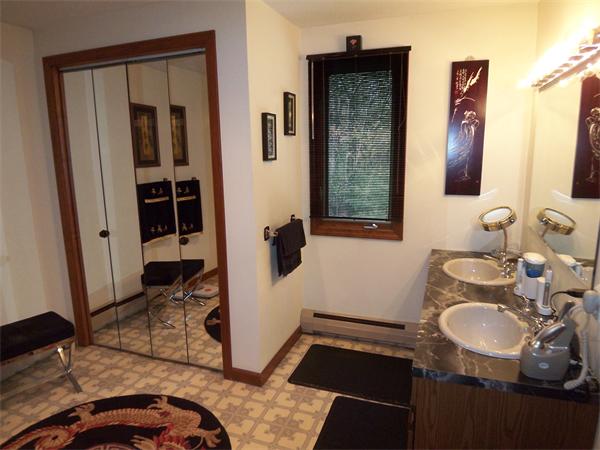 18 Dunham Road Freetown, MA 02702 - Photo 21 of 28 a bathroom with a sink and a mirror