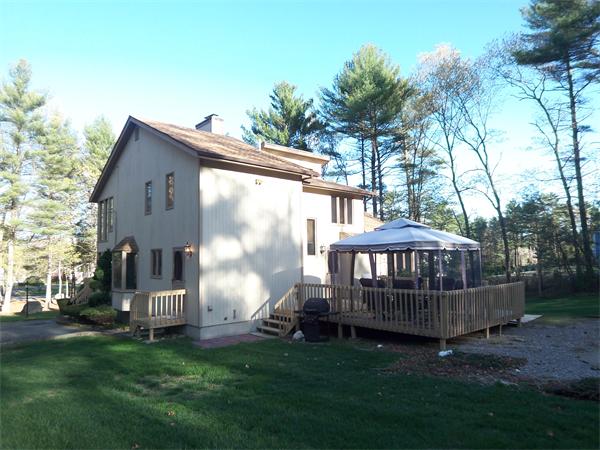 18 Dunham Road Freetown, MA 02702 - Photo 23 of 28 a view of backyard with deck and garden