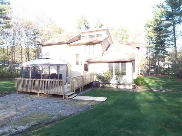 18 Dunham Road Freetown, MA 02702 - Photo 24 of 28 a front view of a house with garden