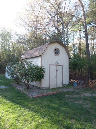 18 Dunham Road Freetown, MA 02702 - Photo 25 of 28 a backyard of a house with plants and large tree
