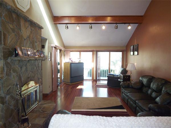 18 Dunham Road Freetown, MA 02702 - Photo 4 of 28 a living room with furniture rug and a large window